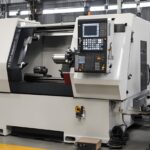 cnc lathe machine working principle